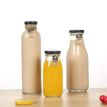 Load image into Gallery viewer, 250ml Wholesale glass beverage bottles 70pcs per order empty milk juice bottles with Lids
