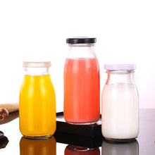 將圖片載入圖庫檢視器 250ml Wholesale glass beverage bottles 70pcs per order empty milk juice bottles with Lids